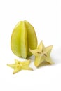 Whole starfruit with slices Royalty Free Stock Photo