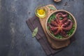 Whole steamed octopus with parsley and spices, copy space