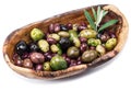 Whole table olives in the wooden bowl. Royalty Free Stock Photo