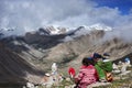 A whole Tibetan family circumambulating Mt. Kailash Royalty Free Stock Photo