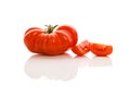 Whole tomato on white background. Royalty Free Stock Photo