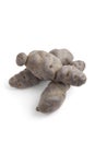 Whole Vitelotte noir potatoes Royalty Free Stock Photo