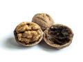 Whole wallnut  half in shell with a wallnut shell intact on the back Royalty Free Stock Photo