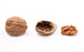 Whole walnuts, kernels and shells Royalty Free Stock Photo