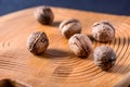 Whole walnuts on wooden table Royalty Free Stock Photo
