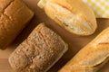 Whole wheat bread and French baguette Royalty Free Stock Photo