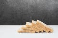 Whole wheat bread lay on a white background with a black wall Royalty Free Stock Photo
