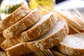 Whole wheat bread slices on table Royalty Free Stock Photo