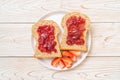 whole wheat bread with strawberry jam and fresh strawberry Royalty Free Stock Photo