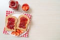 whole wheat bread with strawberry jam and fresh strawberry Royalty Free Stock Photo