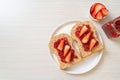 whole wheat bread with strawberry jam and fresh strawberry Royalty Free Stock Photo