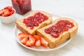 whole wheat bread with strawberry jam and fresh strawberry Royalty Free Stock Photo