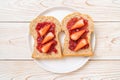 whole wheat bread with strawberry jam and fresh strawberry Royalty Free Stock Photo