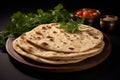 Whole wheat flatbread Indian traditional chapati, the phooli air filled roti Royalty Free Stock Photo