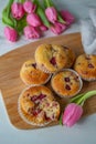 Sweet vanilla raspberry muffins on a table Royalty Free Stock Photo