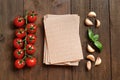 Whole wheat lasagna sheets, tomatoes, garlic and basil Royalty Free Stock Photo