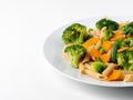 Whole wheat pasta Penne with broccoli, carrots, green peas. Part of plate. Diet menu, proper nutrition, healthy food Royalty Free Stock Photo