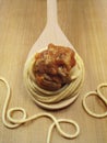 Whole Wheat Pasta on Spoon with Sauce Royalty Free Stock Photo