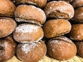 Whole-wheat rye rolls in bread basket Royalty Free Stock Photo