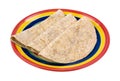 Whole wheat tortillas folded on plate
