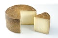 Whole wheel of sheep milk cheese.