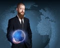 Whole world in his hands. Bearded mature businessman Royalty Free Stock Photo