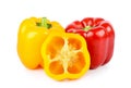 Whole yellow and red bell peppers and half