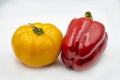 Whole yellow tomato and red bell pepper closeup Royalty Free Stock Photo