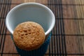 Wholegrain biscuits on white cup