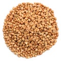 Wholegrain buckwheat in round heap shape, isolated