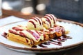 Wholegrain flour belgian waffle with a scoop of ice cream and berry sauce, close up, copy space. Belgian waffle with ice cream, Royalty Free Stock Photo