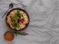 Wholegrain Oatmeal porridge bowl with fresh berries, fruits, nuts mint leaves tea cup. Healthy food oat meal breakfast Royalty Free Stock Photo