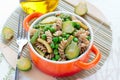 Wholegrain pasta with green vegetables in ceramic pan Royalty Free Stock Photo