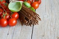 Wholegrain rye spaghetti, tomatoes and herbs