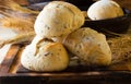 Wholemeal bread whish flax linen seeds and wheat spike Royalty Free Stock Photo