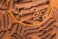 Wholemeal Pasta. Integral Penne into a bowl Royalty Free Stock Photo