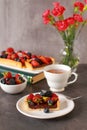 A wholemeal tart with chocolate filling  and fresh berry fruit Royalty Free Stock Photo