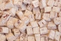 A wholesale box of rosewater-flavored Turkish delight sweet cubes dusted with icing sugar Royalty Free Stock Photo