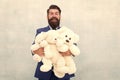Wholesale. Love and kindness. Happy adulthood. Man hug many teddy bear toys. Birthday gift concept. Teddy bear pleasant