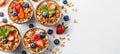 Wholesome american breakfast granola with milk, berries, and honey on bright white background