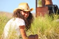 Wholesome brunette woman outdoors in a field Royalty Free Stock Photo