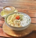 Wholesome Delight: Green Smoothie Bowl and Latte on Wooden Table