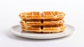 Wholesome Delight: Three Round Waffles Stacked on White Plate