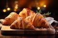 Wholesome goodness, homemade croissants rest on a rustic wooden tabletop