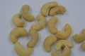 Wholesome and healthy food, natural nuts, large cashew nuts arranged on a white background.