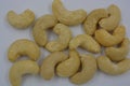 Wholesome and healthy food, natural nuts, large cashew nuts arranged on a white background.