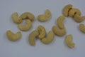 Wholesome and healthy food, natural nuts, large cashew nuts arranged on a white background.