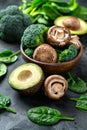 Wholesome vegan lunch bowl with avocado, mushrooms, broccoli, and spinach for a nutritious meal