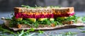Wholesome Vegan Sandwiches Featuring Vibrant Beetroot Hummus, Beet, Cheese, Avocado, And Arugula