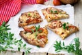 Wholewheat pizza with tomatoes, cheese and herbs